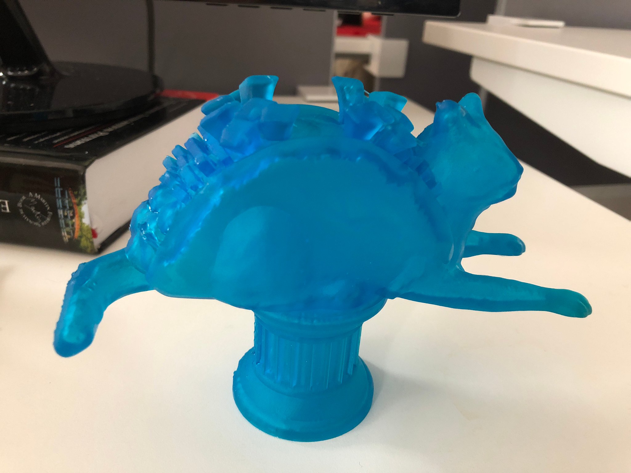 3d printed taco cat on a pedestal trophy
